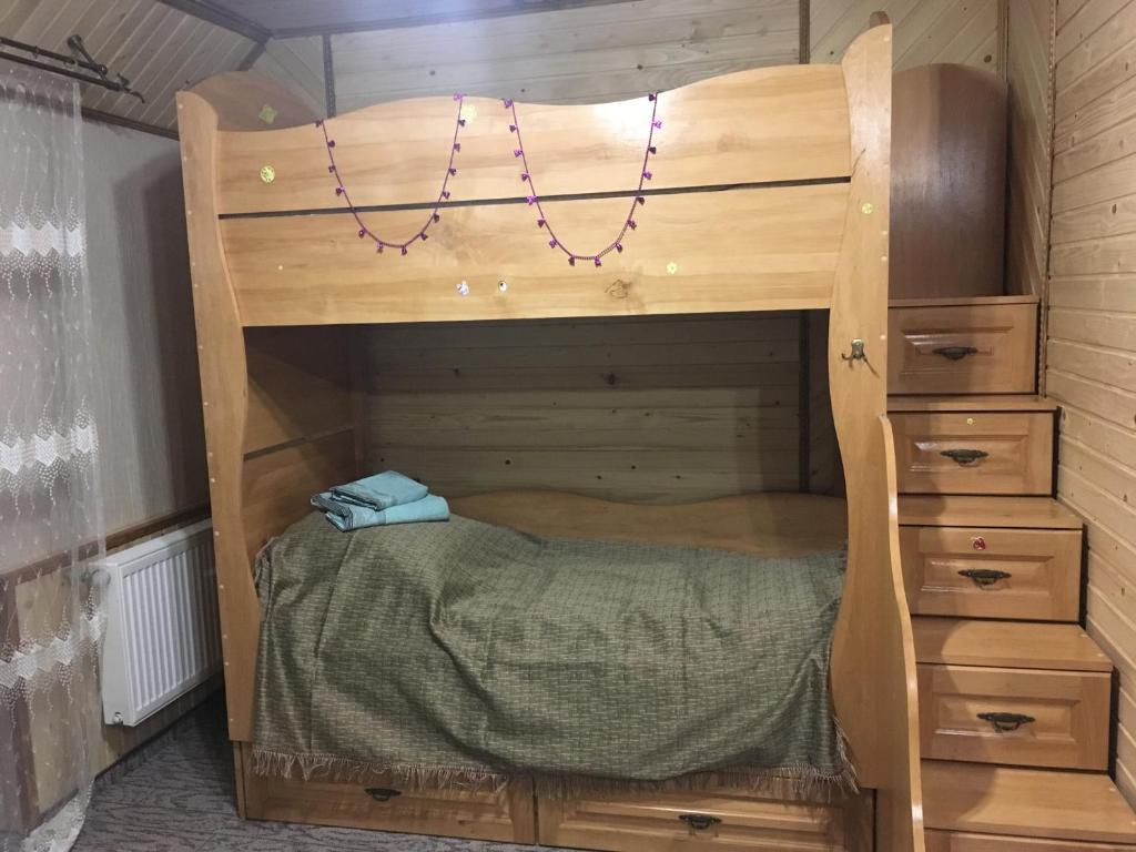 Postel nebo postele na pokoji v ubytování Skarbivka