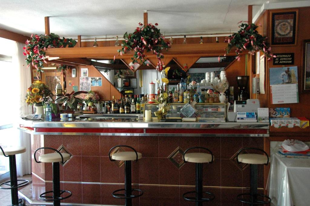 Lounge nebo bar v ubytování Pensión Venecia