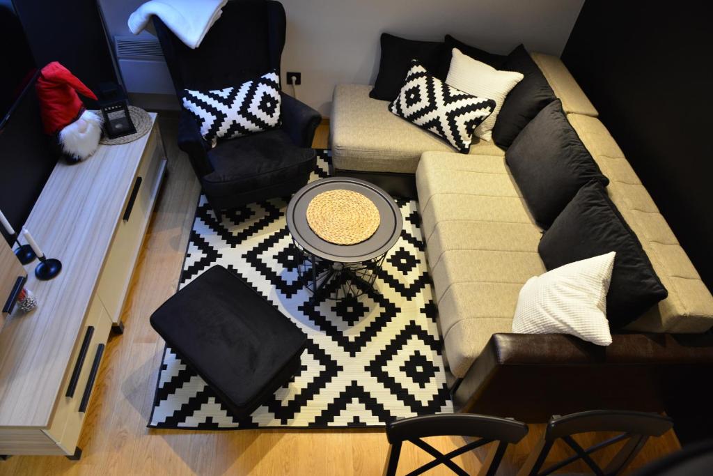 an overhead view of a living room with a couch at Višnja apartment in Kopaonik