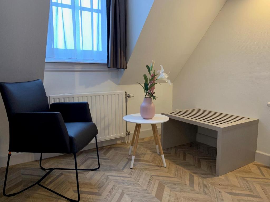 Posezení v ubytování Hotel In den Brouwery
