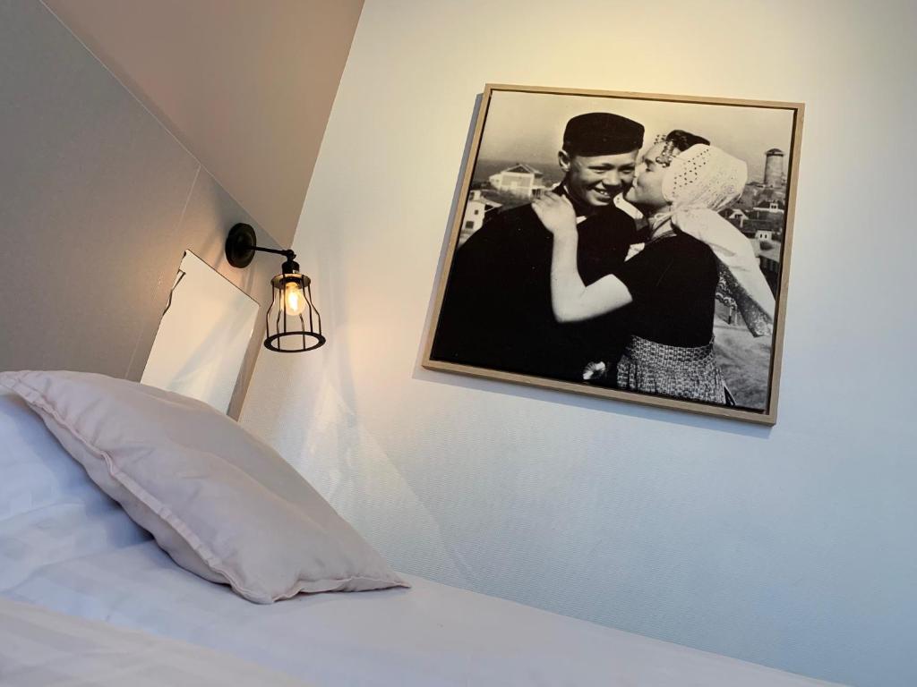 Postel nebo postele na pokoji v ubytování Hotel In den Brouwery