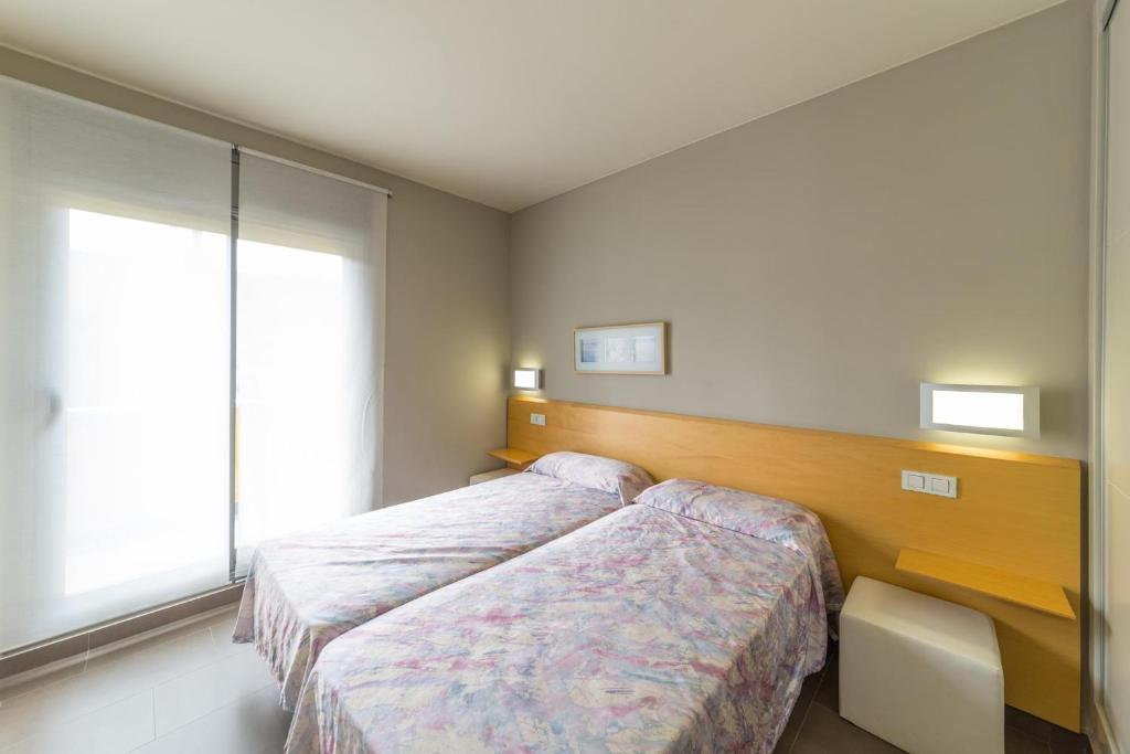 Postel nebo postele na pokoji v ubytování Villa Marianna