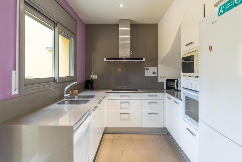 Kuchyň nebo kuchyňský kout v ubytování Villa Marianna