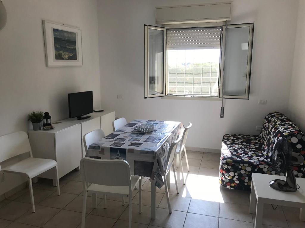 Telewizja i/lub zestaw kina domowego w obiekcie Villetta San Lorenzo - Marzamemi