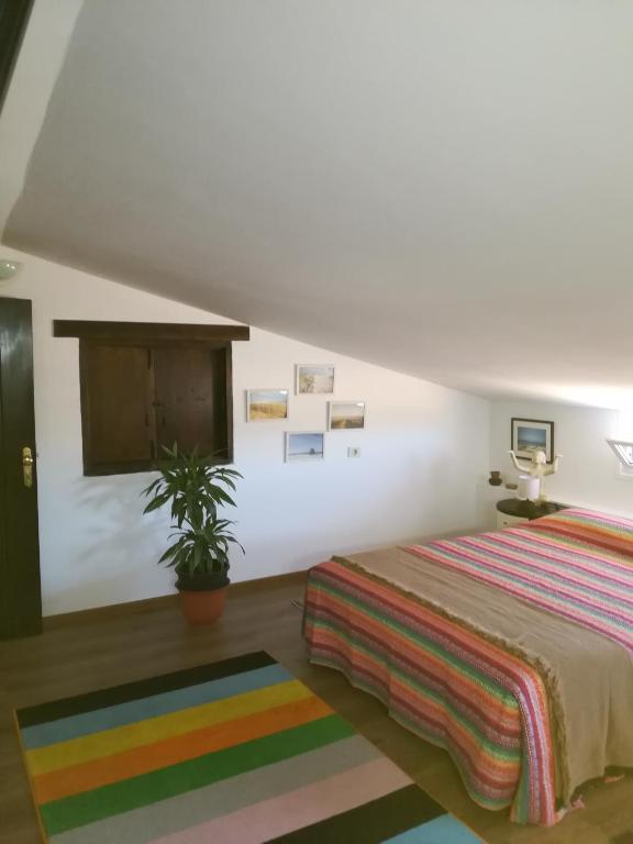 Postel nebo postele na pokoji v ubytování Casa Papi