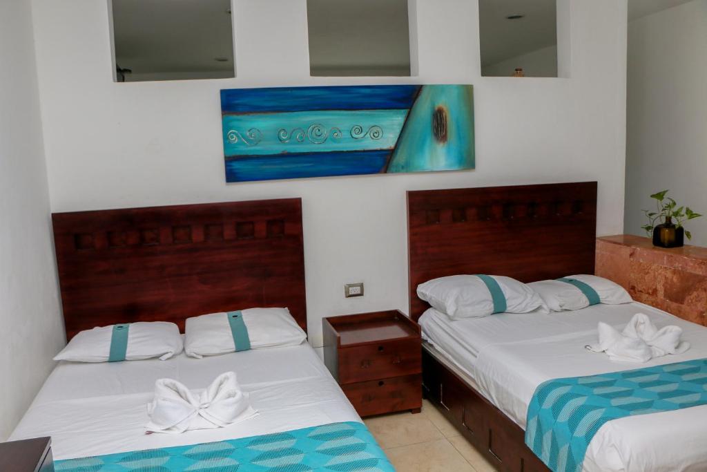 Postel nebo postele na pokoji v ubytování Playa Linda Hotel