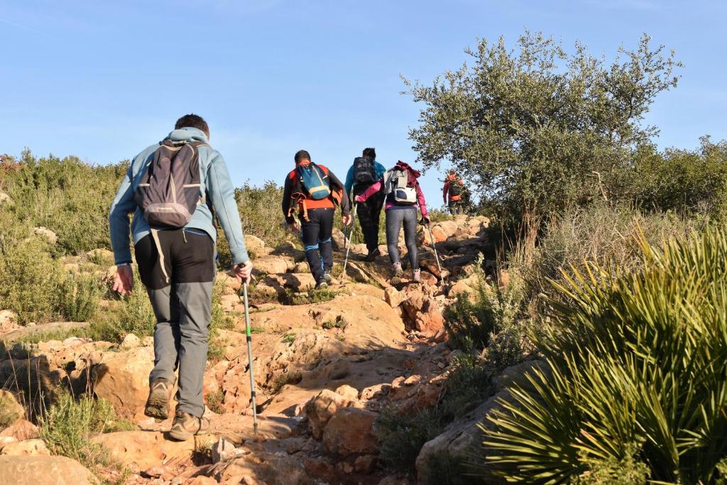 a group of people walking on a trail at Casa Nuri de Rei La Pobla Tornesa in Puebla Tornesa