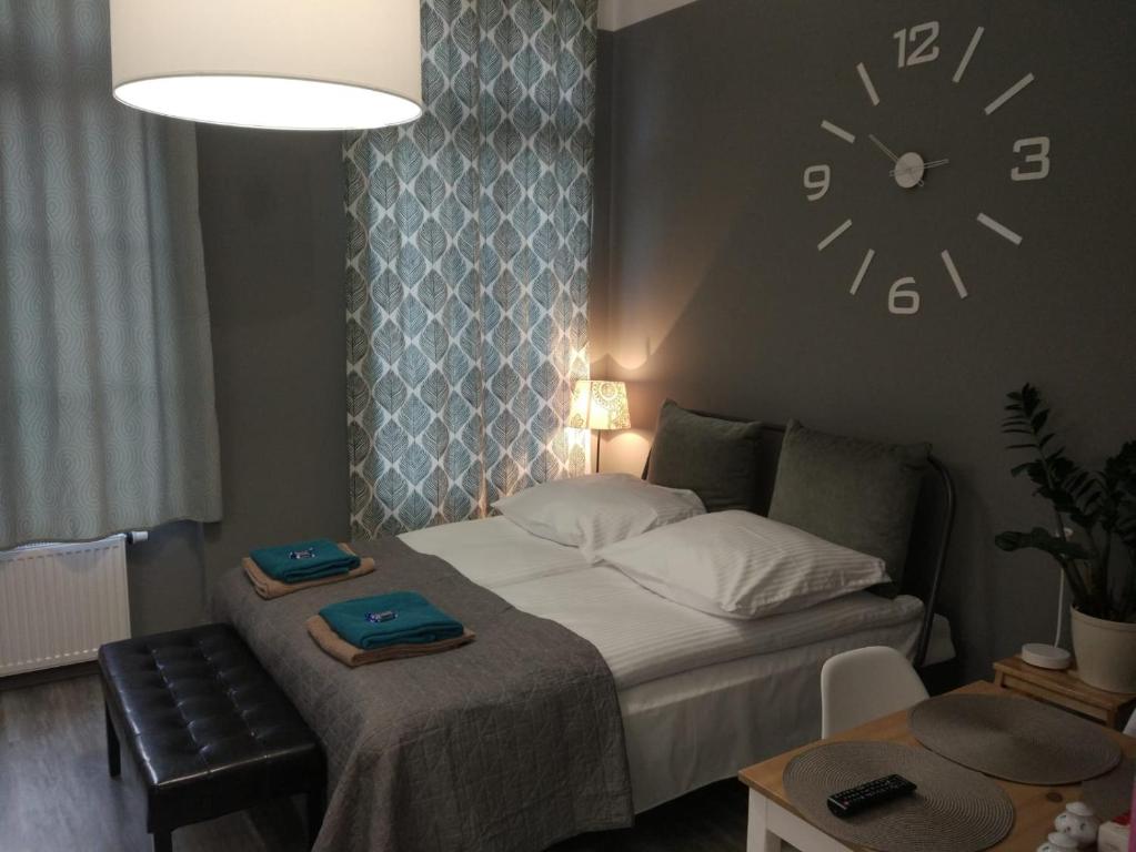 Posteľ alebo postele v izbe v ubytovaní Apartament Easy Stay Center