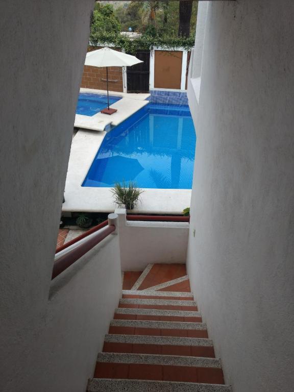 Bazén v ubytování HOTEL JD TEPOZTLÁN nebo v jeho okolí