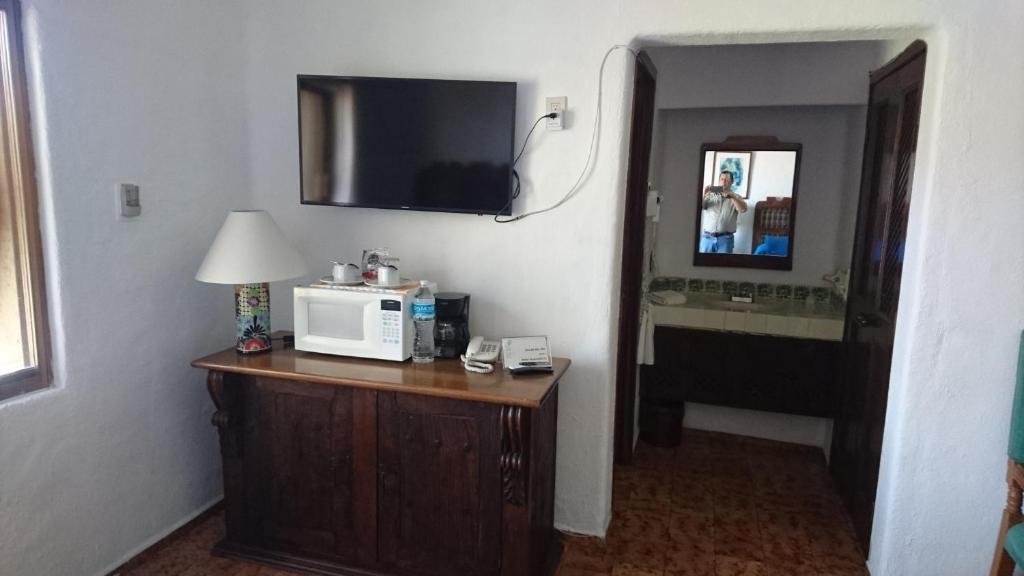 TV a/nebo společenská místnost v ubytování Villas del Sol en Los Tules