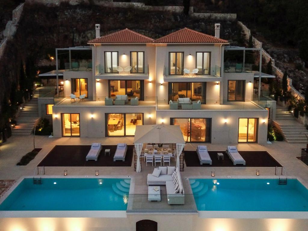 an aerial view of a house with a swimming pool at My Villa Corfu in Nisakion