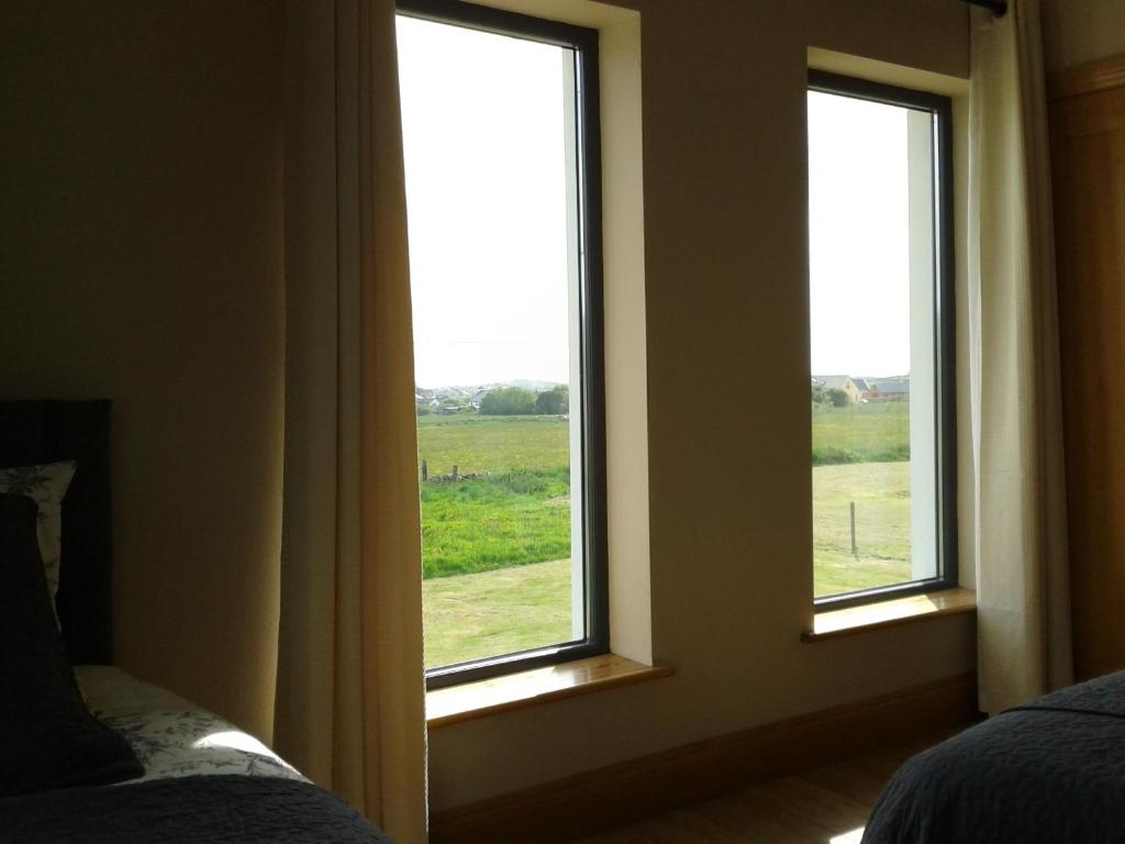 Postel nebo postele na pokoji v ubytování Blackberry Lodge Accommodation
