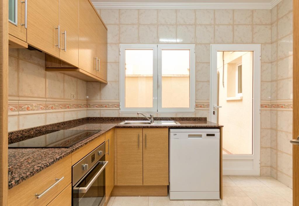 Kuchyňa alebo kuchynka v ubytovaní Residential jardín del pintor - la casa amarilla