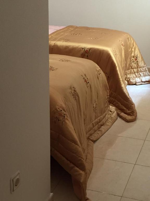 Posteľ alebo postele v izbe v ubytovaní Residential jardín del pintor - la casa amarilla