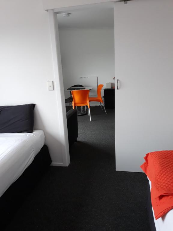 Postel nebo postele na pokoji v ubytování Mokau Motels