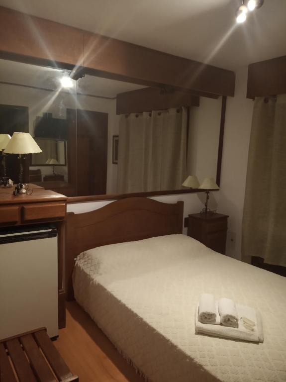 Postel nebo postele na pokoji v ubytování Wiener Haus Hotel