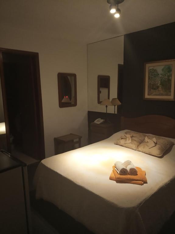 Postel nebo postele na pokoji v ubytování Wiener Haus Hotel