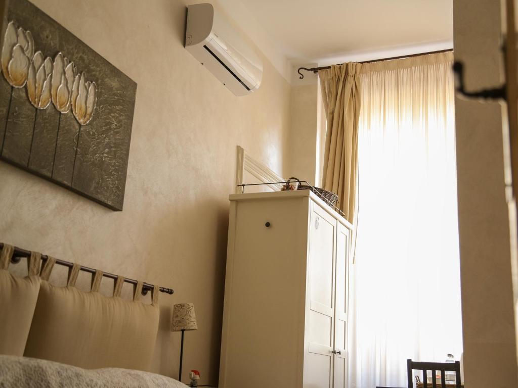 Postel nebo postele na pokoji v ubytování Hotel Portofino