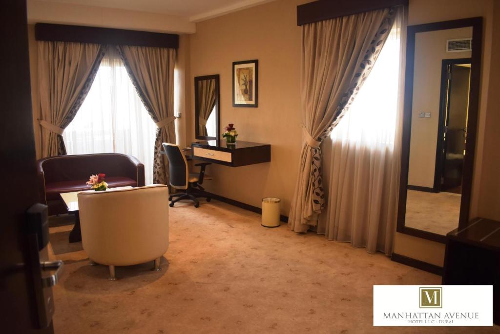 Posezení v ubytování Manhattan Avenue Hotel