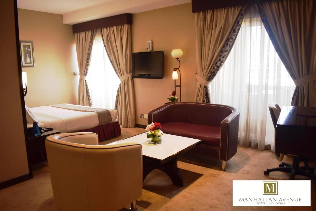 Postel nebo postele na pokoji v ubytování Manhattan Avenue Hotel