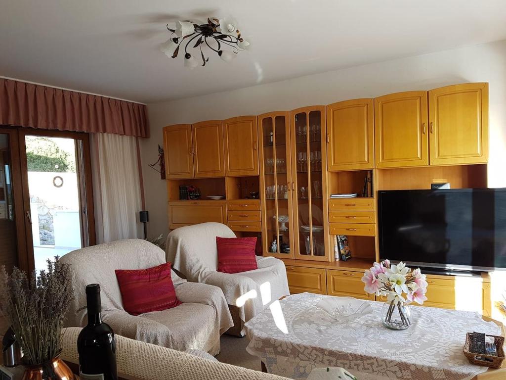 TV a/nebo společenská místnost v ubytování Corinna Zavala Resort