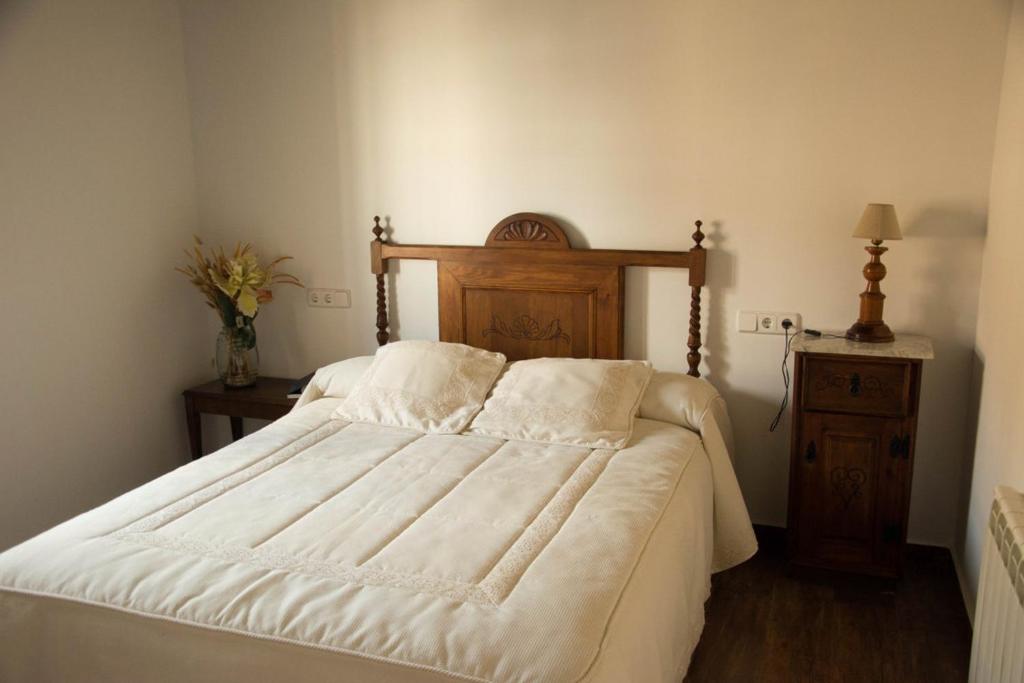 Кровать или кровати в номере Casa Rural Gafas