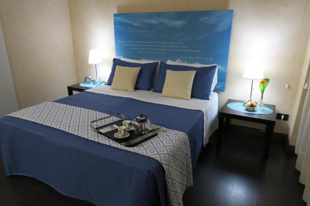 Postel nebo postele na pokoji v ubytování Mare Nostrum Petit Hôtel