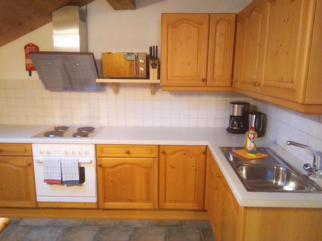 Kuchyň nebo kuchyňský kout v ubytování Bauernhof Hintenberg