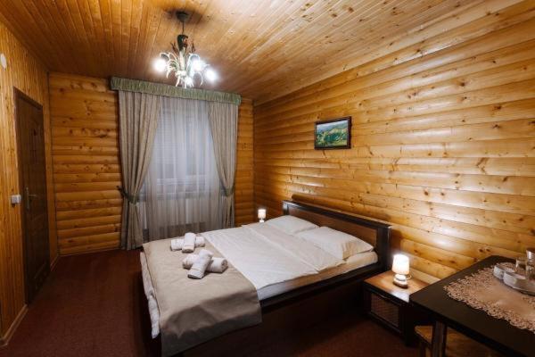 Postel nebo postele na pokoji v ubytování Hotel Marilen