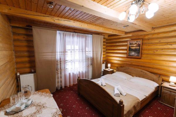 Postel nebo postele na pokoji v ubytování Hotel Marilen