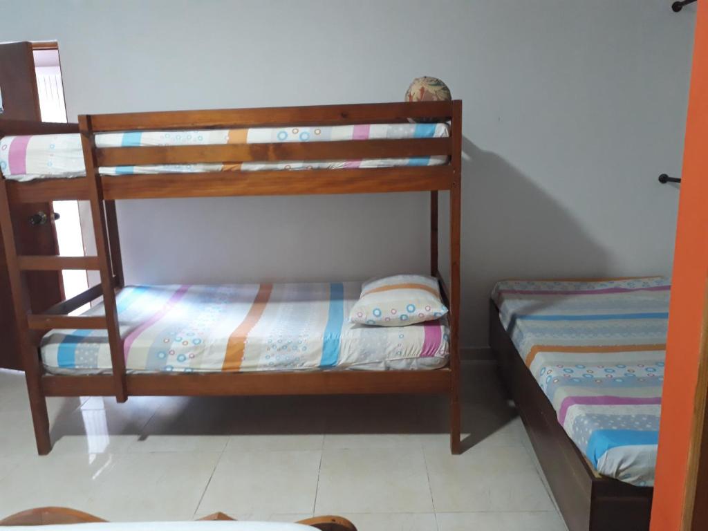 Postel nebo postele na pokoji v ubytování Ludisa House