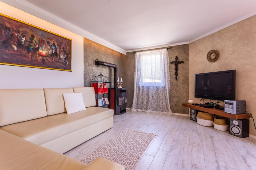 Telewizja i/lub zestaw kina domowego w obiekcie Villa Pinia