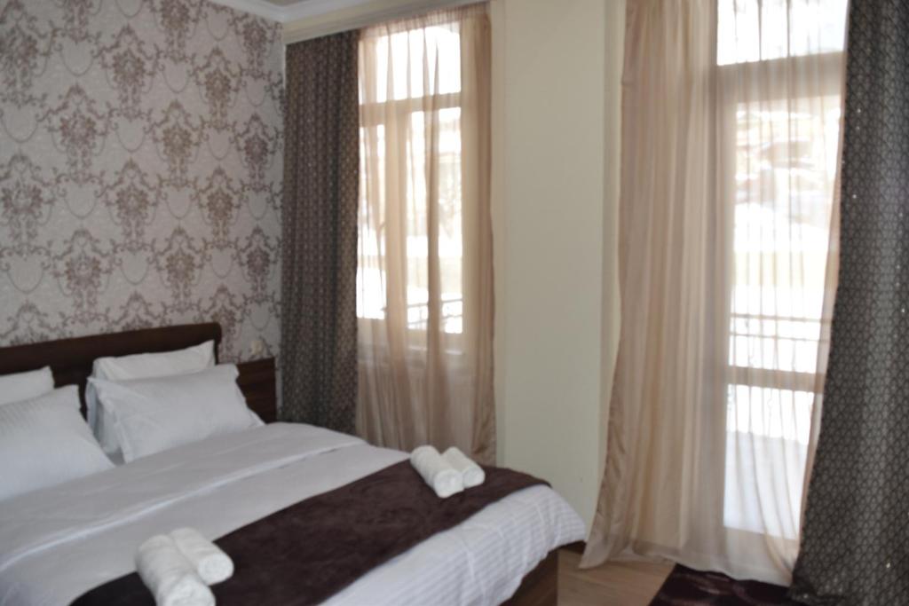 Postel nebo postele na pokoji v ubytování Hotel IVERIA