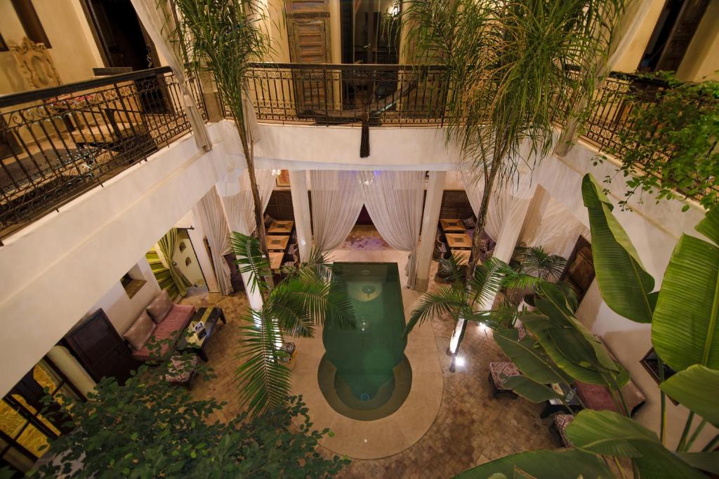 an overhead view of a room filled with plants at Dar Alif in Marrakesh