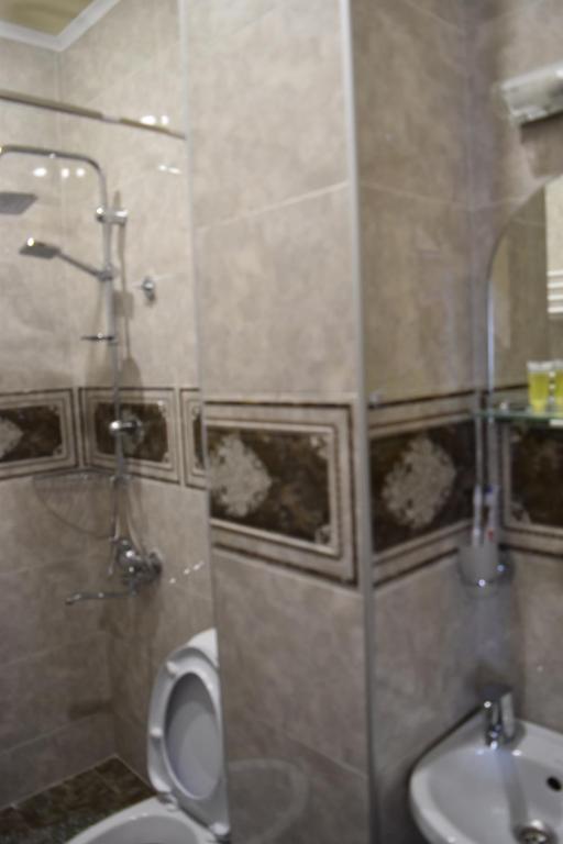Koupelna v ubytování Hotel IVERIA