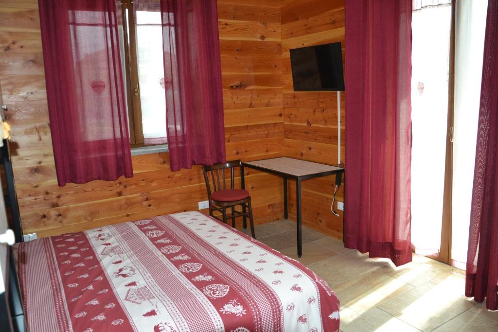 Postel nebo postele na pokoji v ubytování B&B L'albero e le stelle