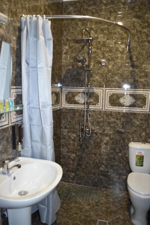 Koupelna v ubytování Hotel IVERIA