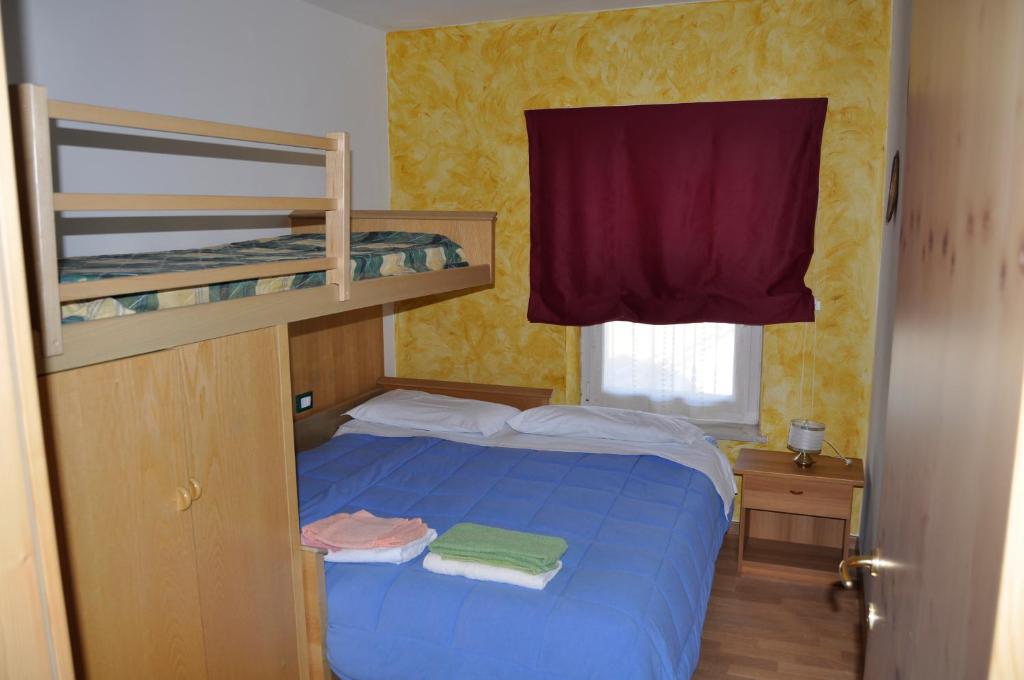Postel nebo postele na pokoji v ubytování Silvano Fanti