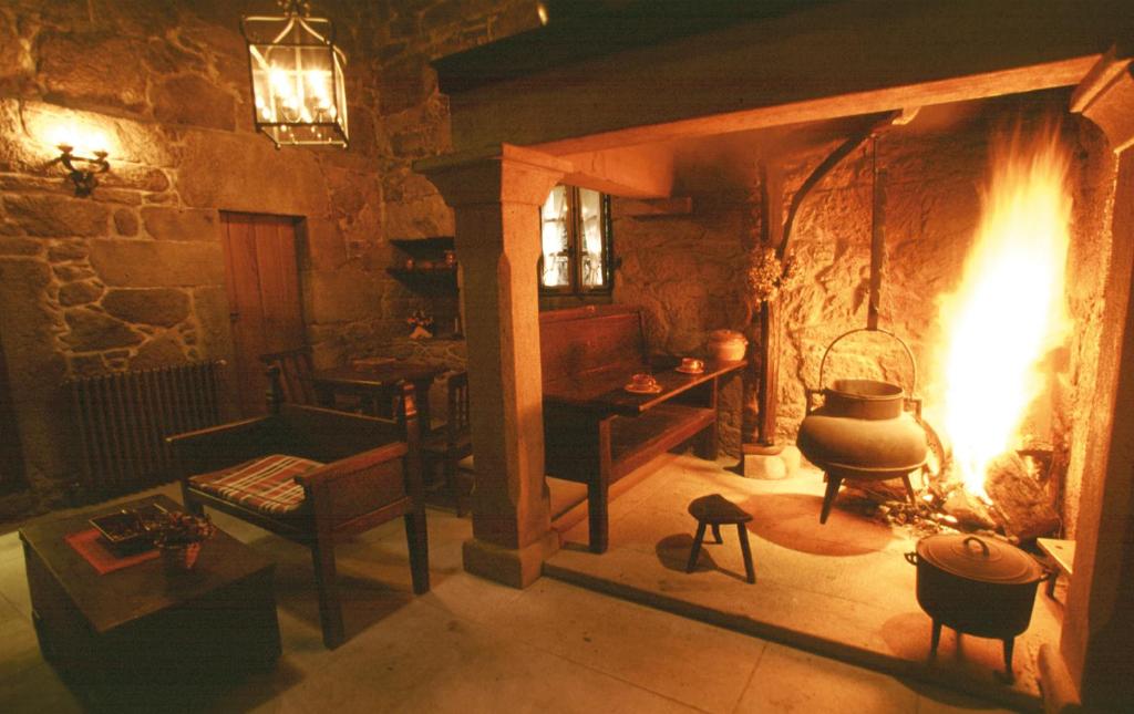 A seating area at Fervenza Casa Grande & Restaurante