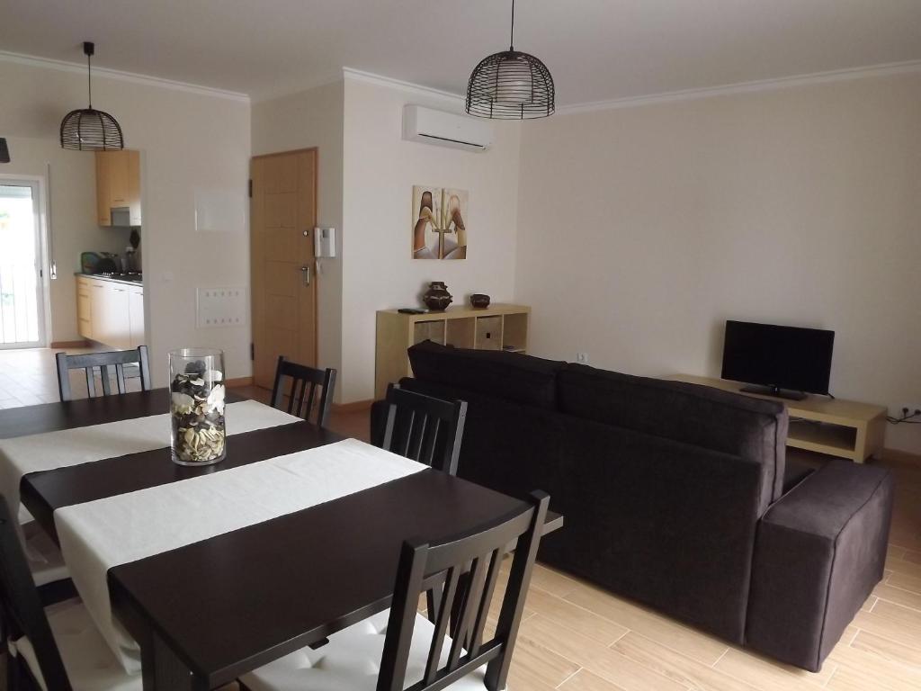 TV a/nebo společenská místnost v ubytování EntreCubos Guesthouse