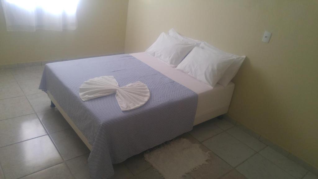 Cama ou camas em um quarto em Pousada Nordestina