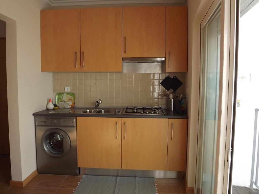 Kuchyň nebo kuchyňský kout v ubytování EntreCubos Guesthouse