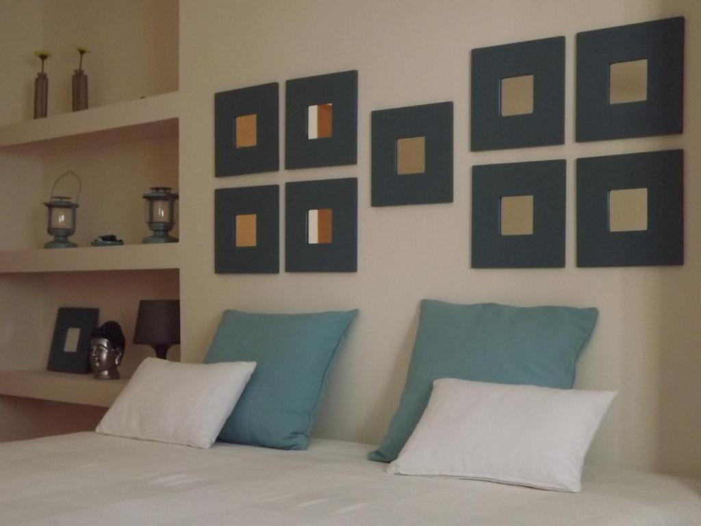 Postel nebo postele na pokoji v ubytování EntreCubos Guesthouse