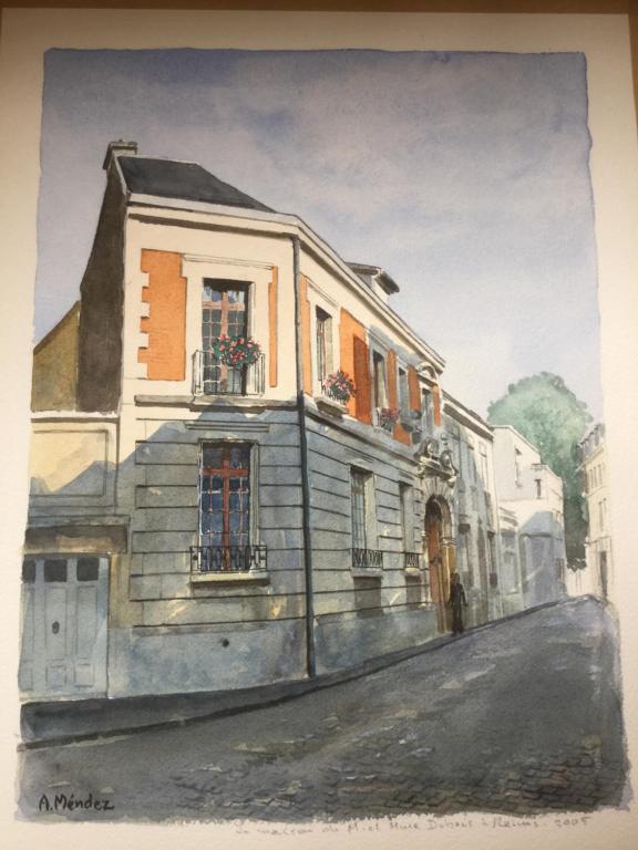 a painting of a house on a street at Le Clos des Roys in Reims