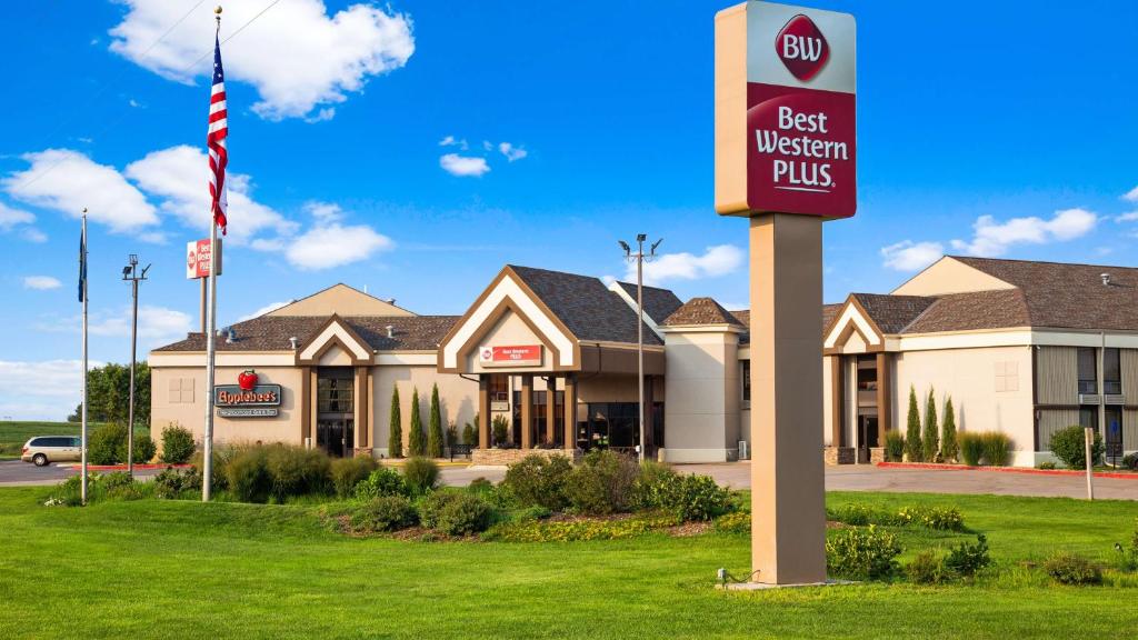 a best western plus sign in front of a building at Best Western Plus York Hotel and Conference Center in York