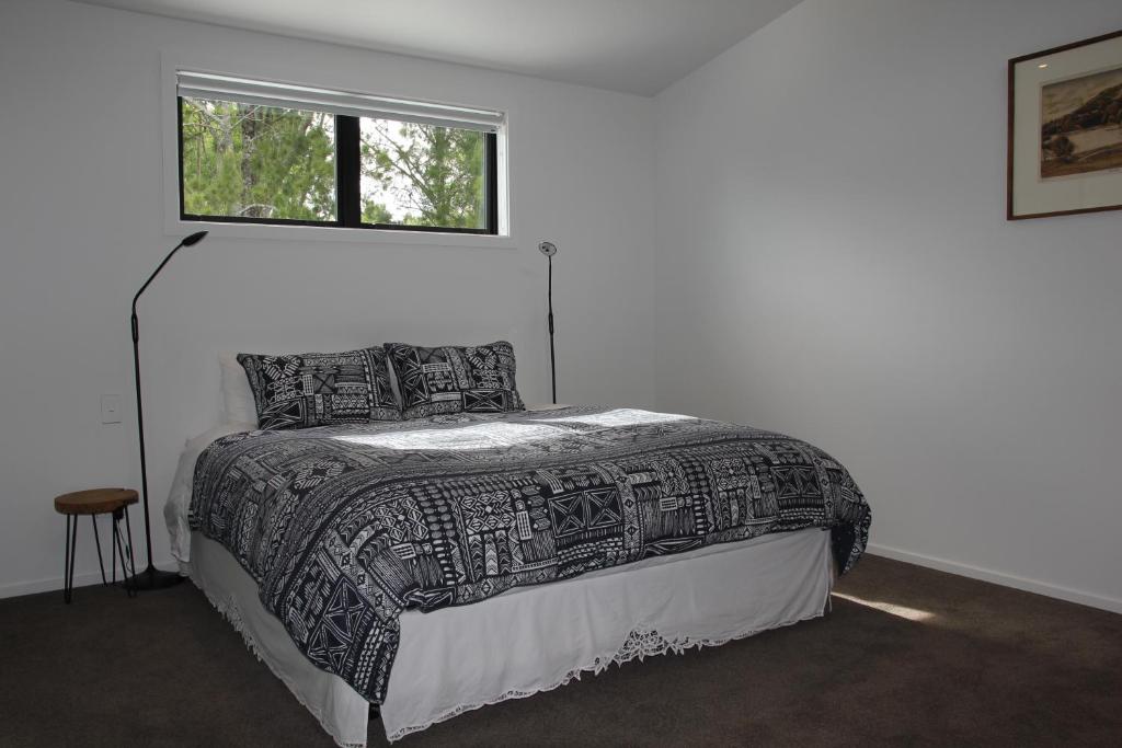 Letto o letti in una camera di Korepo Lodge @ Ruby Bay