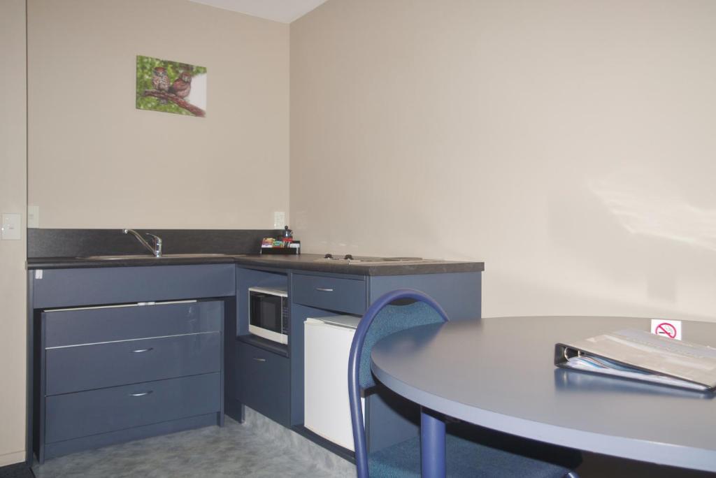 Kuchyň nebo kuchyňský kout v ubytování Phoenix Motels