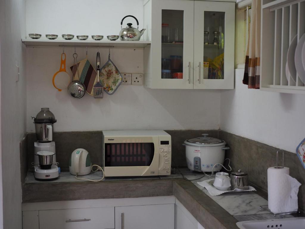 Kuchyň nebo kuchyňský kout v ubytování Florence Cottage