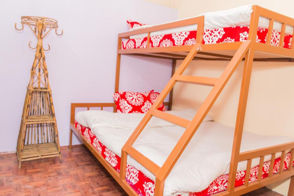 Postel nebo postele na pokoji v ubytování Hostel Swastik