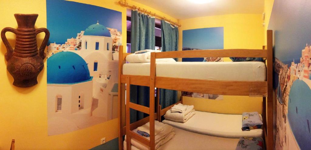 Postel nebo postele na pokoji v ubytování Europa Hostel Portorož